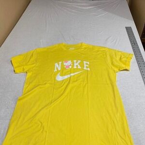 Nike Women’s Yellow Graphic Logo Tee